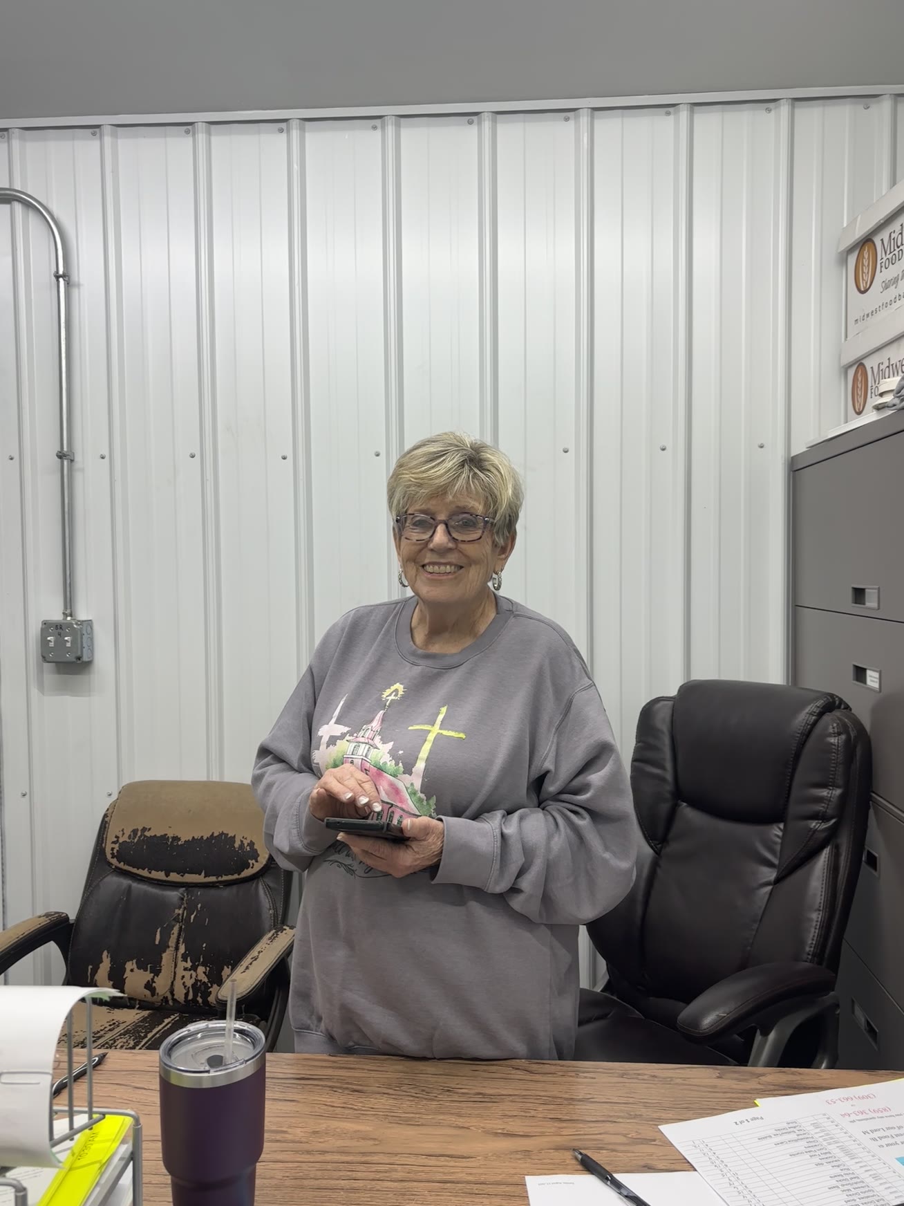 Our wonderful team member, with a sweet smile, handles administrative tasks, ensuring everything runs smoothly so we can continue serving our community.