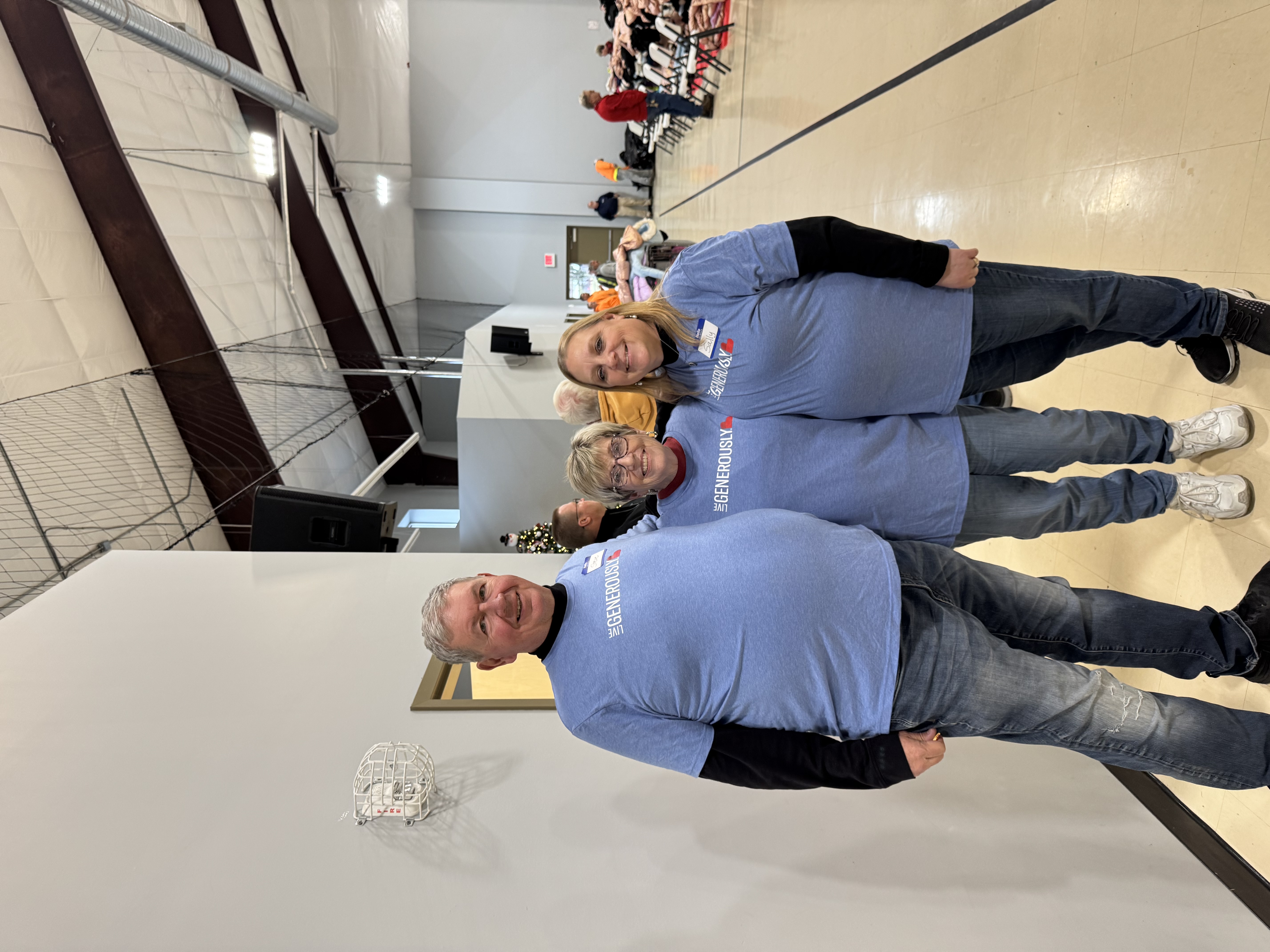 Our wonderful team members, sporting their "Live Generously" shirts, are ready to serve with kind smiles and open hearts. We are so blessed by their dedication to our mission!