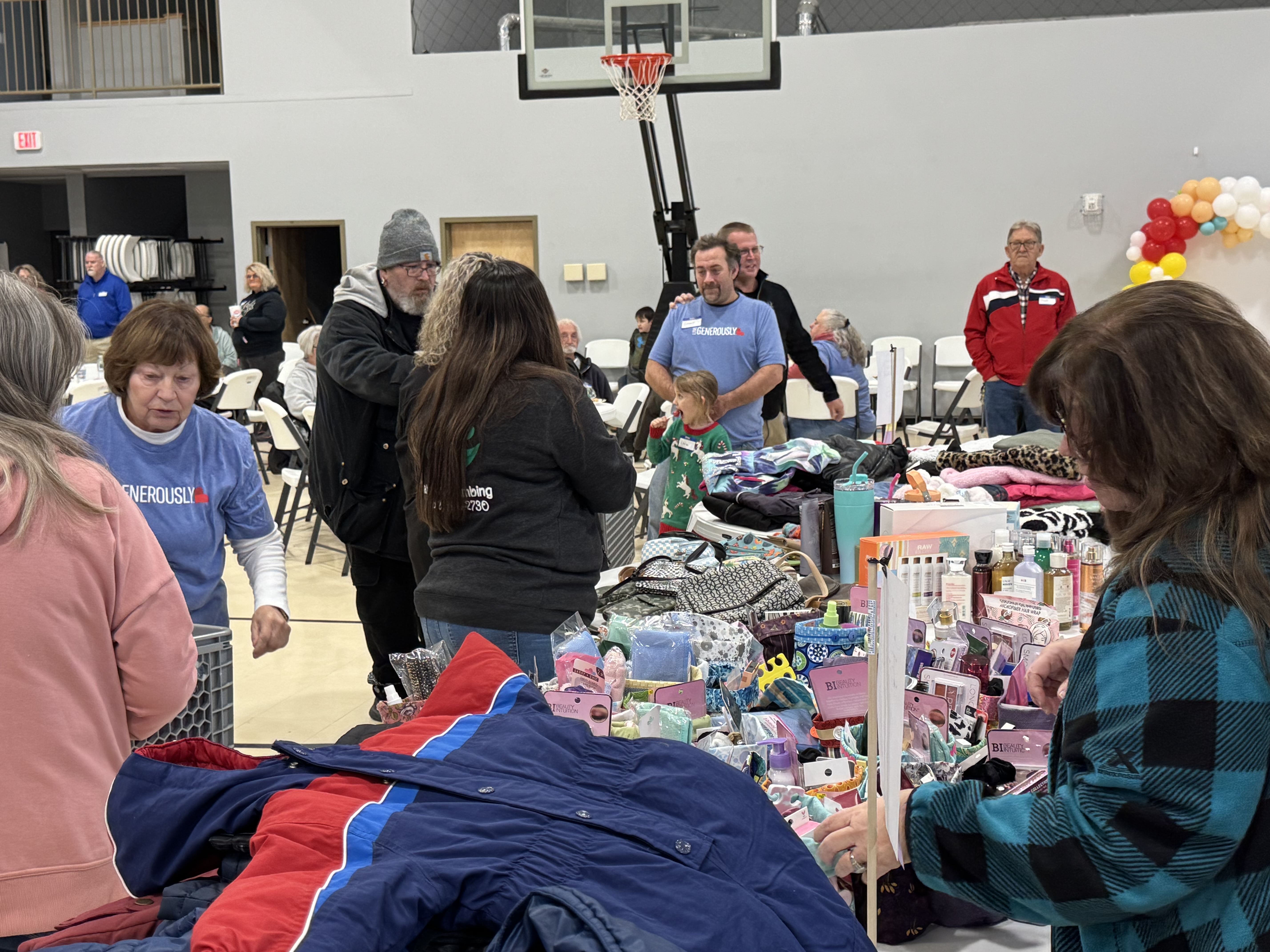 Our team is joyfully serving, sharing a wide array of blessings and provisions with our community, embodying the true spirit of generosity and care. We are so grateful for every opportunity to serve!