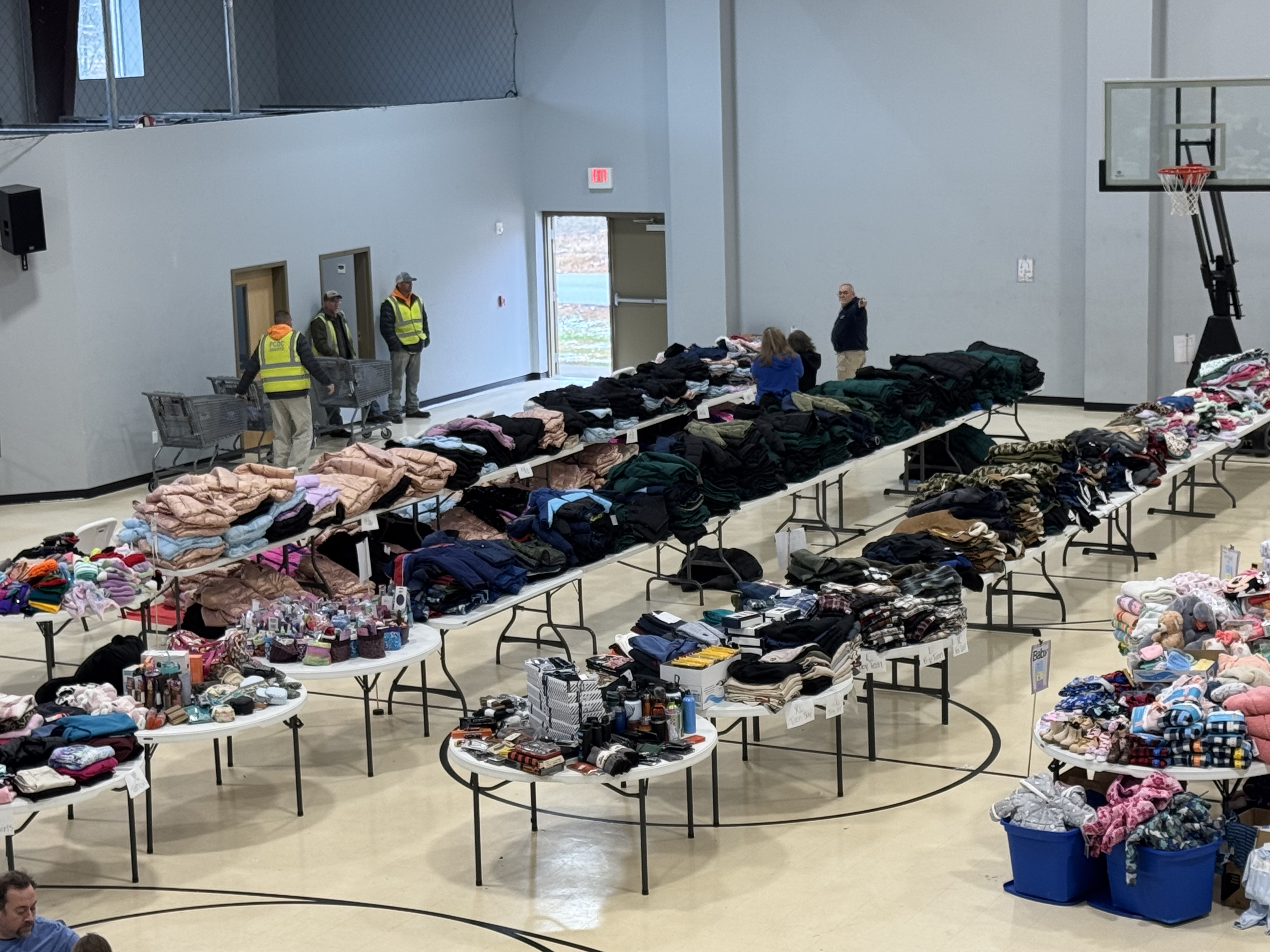 Our ministry is blessed to organize a clothing and essentials distribution event, filling tables with warm items and necessities for our community. We are grateful to the dedicated volunteers who help us share God's love through these practical acts of service.